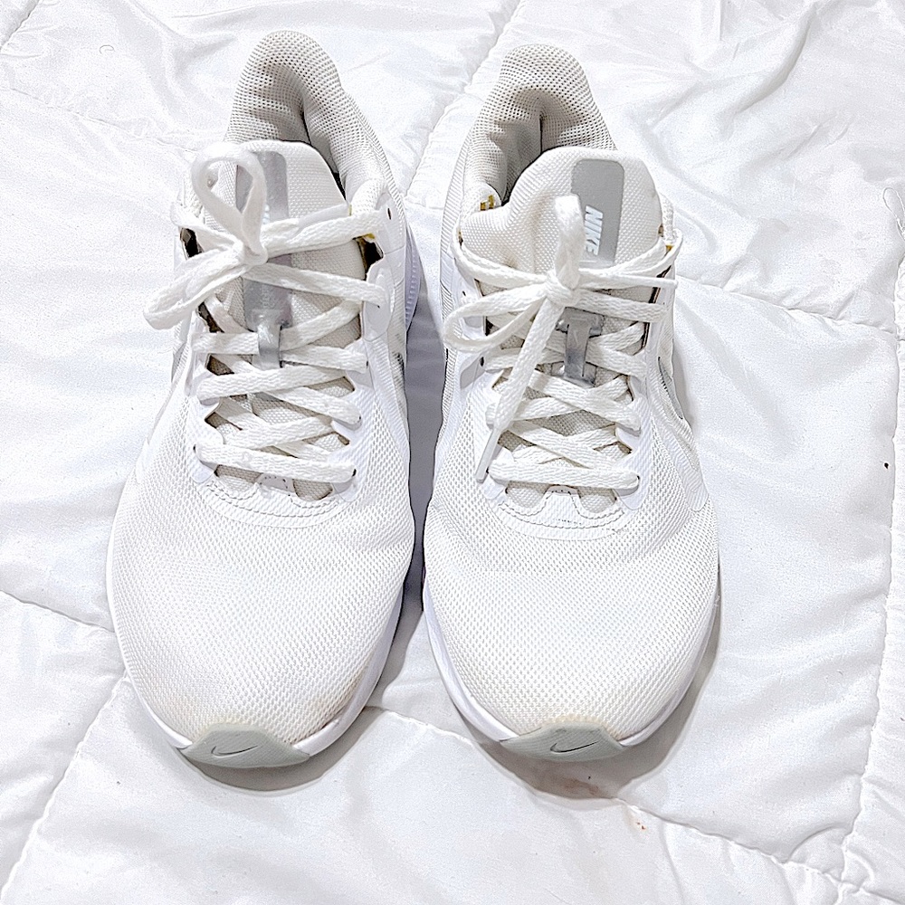 Size 10 Nike downshifter style tennis shoes white and silver